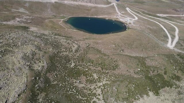 Aerial view of a small lake at the top of the mountain, a naturally formed lake, in Turkey