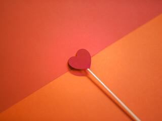 Cutout with a paper heart. Copy space. To celebrate Valentine's Day