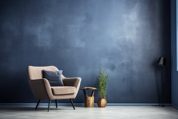  a chair and a table in a room with a blue wall and a potted plant in the corner of the room.