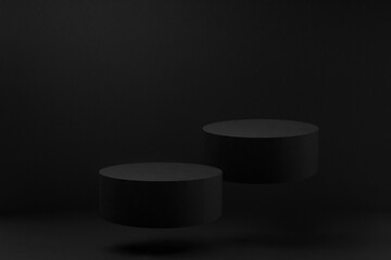 Two black round podiums levitate, mockup on black background with shadow. Template for presentation...