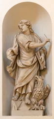 Schilderijen op glas VICENZA, ITALY - NOVEMBER 6, 2023: The carved satue of St. John the Evanglist in the church Chiesa di San Filippo Neri by Orazio Marinali (1643 – 1720). © Renáta Sedmáková