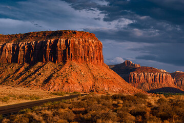 Canyon landscape with rocky sandstone formations at sunset