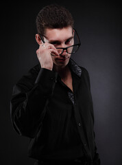 Fototapeta premium Close up portrait of a handsome man in glasses