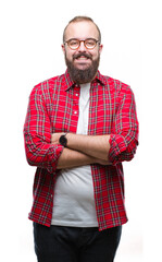 Young caucasian hipster man wearing glasses over isolated background happy face smiling with crossed arms looking at the camera. Positive person.