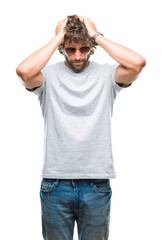 Fototapeta premium Handsome hispanic model man wearing sunglasses over isolated background suffering from headache desperate and stressed because pain and migraine. Hands on head.