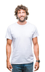 Obraz premium Handsome hispanic model man over isolated background with a happy and cool smile on face. Lucky person.