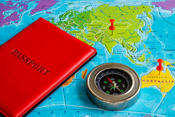 Passport on world map, vacation trip concept. Planning travel