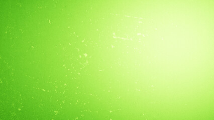 Cement wall background with smudge mixed with glare effect with a gradient of light green tones....