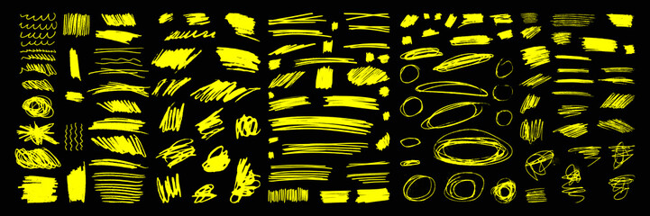 Set of yellow vector grungy strikethrough graphic elements. Street art texture hand drawn pencil underlines, scribble emphasis lines, crazy hatches, and squiggles. Each element is united and isolated © babayuka