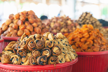 Colorful dried fruits and nuts at the Siab or Siyob bazaar (Siyob bozori). Samarkand, Uzbekistan,...