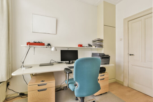 Modern home office interior with desk and computer