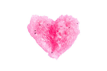 Cosmetic pink scrub in the shape of a heart. Peeling cosmetic sample texture isolated on white...