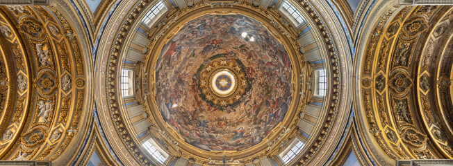 ROME, ITALY - SEPTEMBER  1, 2021:  The fresco of Glory of St. Agnes in cupola in the church Chiesa di Sant Agnese in Agone by Ciro Ferri and Sebastiano Corbellini (second part of 19. cent.).