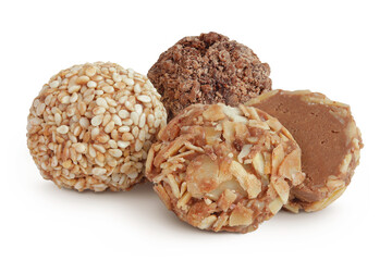 A variety of different truffles Isolated on a white background