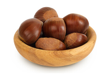chestnut in wooden bowl isolated on white background wit full depth of field.