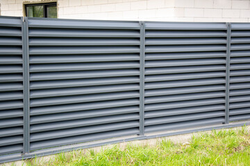 Modern metal profile fence with shutters or blinds