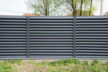 Modern metal profile fence with shutters or blinds