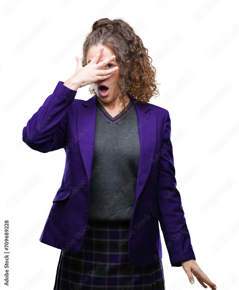 Sticker young brunette student girl wearing school uniform and glasses over isolated background peeking in s