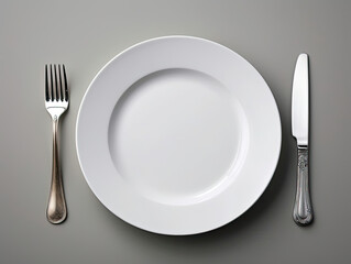 White Plate With Fork and Knife on It, Utensils Set on a Clean Background
