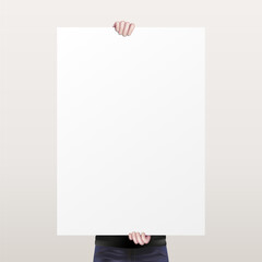 The man holding a white empty sheet of paper