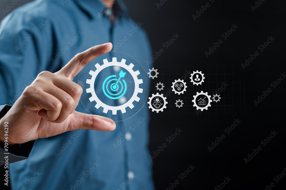 Aufkleber hand holding target icon which for planning development leadership and customer target group concept