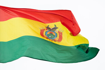 Flag of Bolivia. A large Bolivian flag flutters in the wind. Close-up. Great for news. Bolivia flag on white background