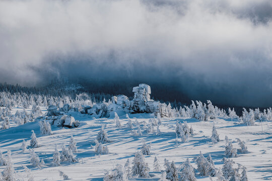 Winter landscape in the mountains with snow and clouds
