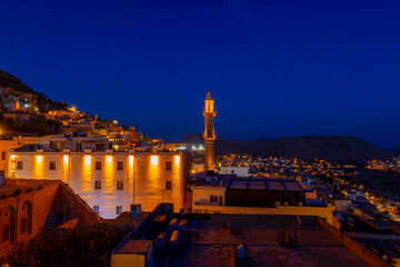 Obraz premium Ancient and stone houses of Old Mardin (Eski Mardin) with Mardin Castle, Located South Eastern of Turkey