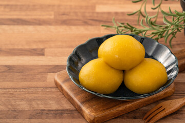 Sweet potato yam bun with ground pork meat, mushroom and chopped bamboo shoot fillings inside.