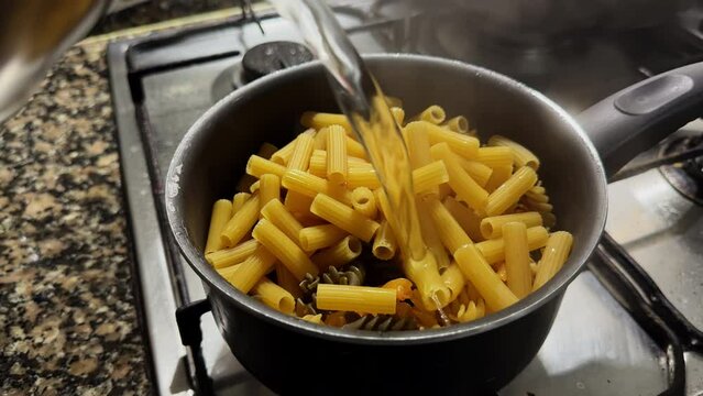 Perfect Pasta Prep: Filling the Pot for Boiling