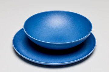 set of modern plates on a table.