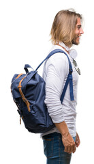 Young handsome tourist man with long hair wearing backpack over isolated background looking to side, relax profile pose with natural face with confident smile.