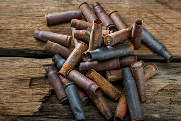 Close-Up 4K Ultra HD Image of Old Rusted Empty Shell Casings - Historical Artifacts