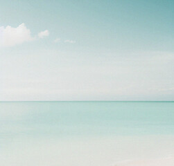 Fototapeta premium Sea and blue sky. Empty summer vacation background. Banner with copy space. Minimalist Wallpaper. Beautiful backdrop for presentation or product. Travel, holiday concept. Minimal flyer or card design