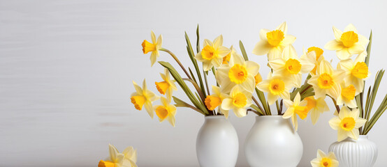 Yellow daffodils in a white pot, in the style of scattered composition, poster, minimalist backgrounds, made of flowers, nikon d850, ornate, shaped canvas

