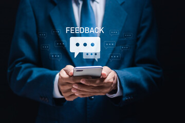 Feedback business quality opinion service communication concept. businessman use smartphone with...