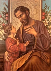 Tuinposter VICENZA, ITALY - NOVEMBER 5, 2023: The traditional catholic image of St. Joseph in the chruch Chiesa di San Lorenzo originali designed by unknown artist.  © Renáta Sedmáková