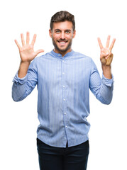 Fototapeta premium Young handsome man over isolated background showing and pointing up with fingers number eight while smiling confident and happy.