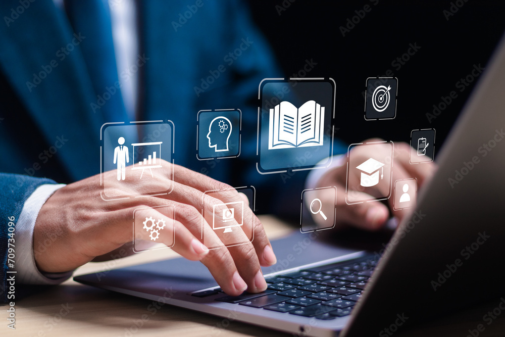 Aufkleber e-learning education concept. businessman use laptop with virtual screen of online e-learning icons 