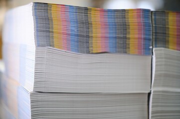 paper pile in a finishing, folder station in an offset printer