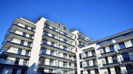 Obraz premium Residential area with modern apartment building. Multi Storey modern, new and stylish living block of flats.