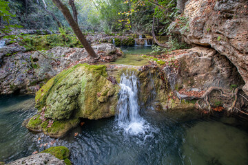 Kurşunlu Waterfall (Turkish: Kurşunlu Şelalesi) is located 19 km away from Antalya, Turkey. It is a beautiful natural area frequently visited by local and foreign tourists.
