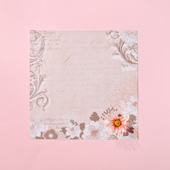 Beige paper, floral pattern, flat lay composition, spring natural elements, creative copy space, greeting card.