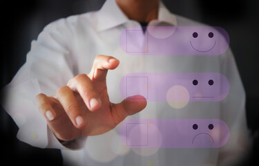 Man touching a virtual screen To rate satisfaction with business services for development Make  business successful with the concept of developing services.