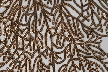 A metallic mosaic resembling leaf cells