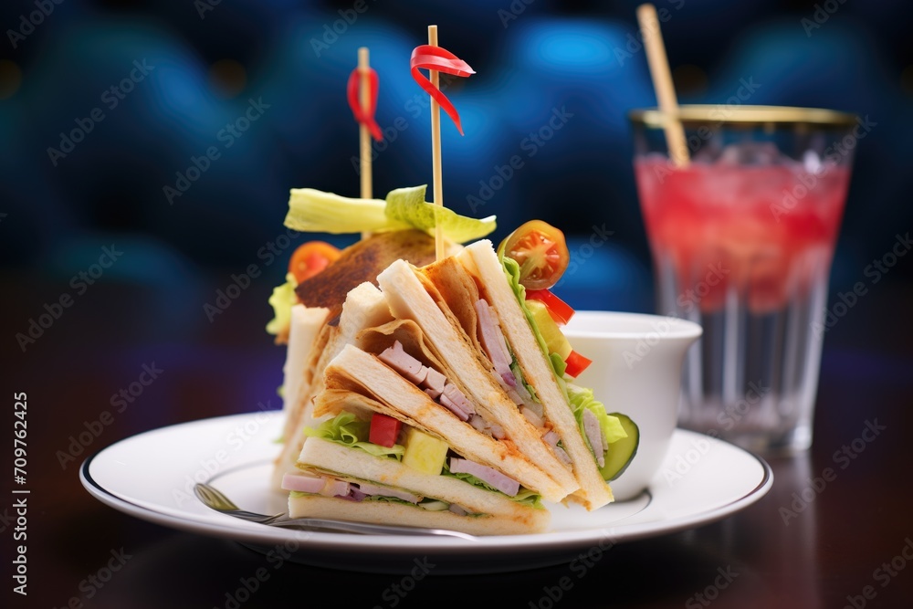 Sticker chips on a plate with a club sandwich