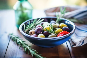 Gordijnen bowl of mixed olives with rosemary sprigs © Alfazet Chronicles