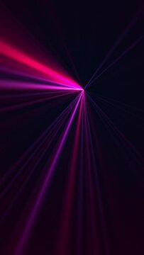 Vertical video - high speed laser light show on black background with flashing neon colored laser beams. This music performance nightlife background animation is full HD and a seamless loop.