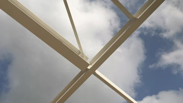 Metal structure, frame. Against the sky.