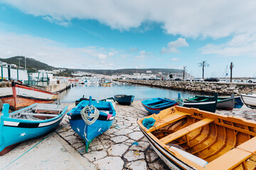 Marina harbor with fishing boats in Sesimbra, Portugal